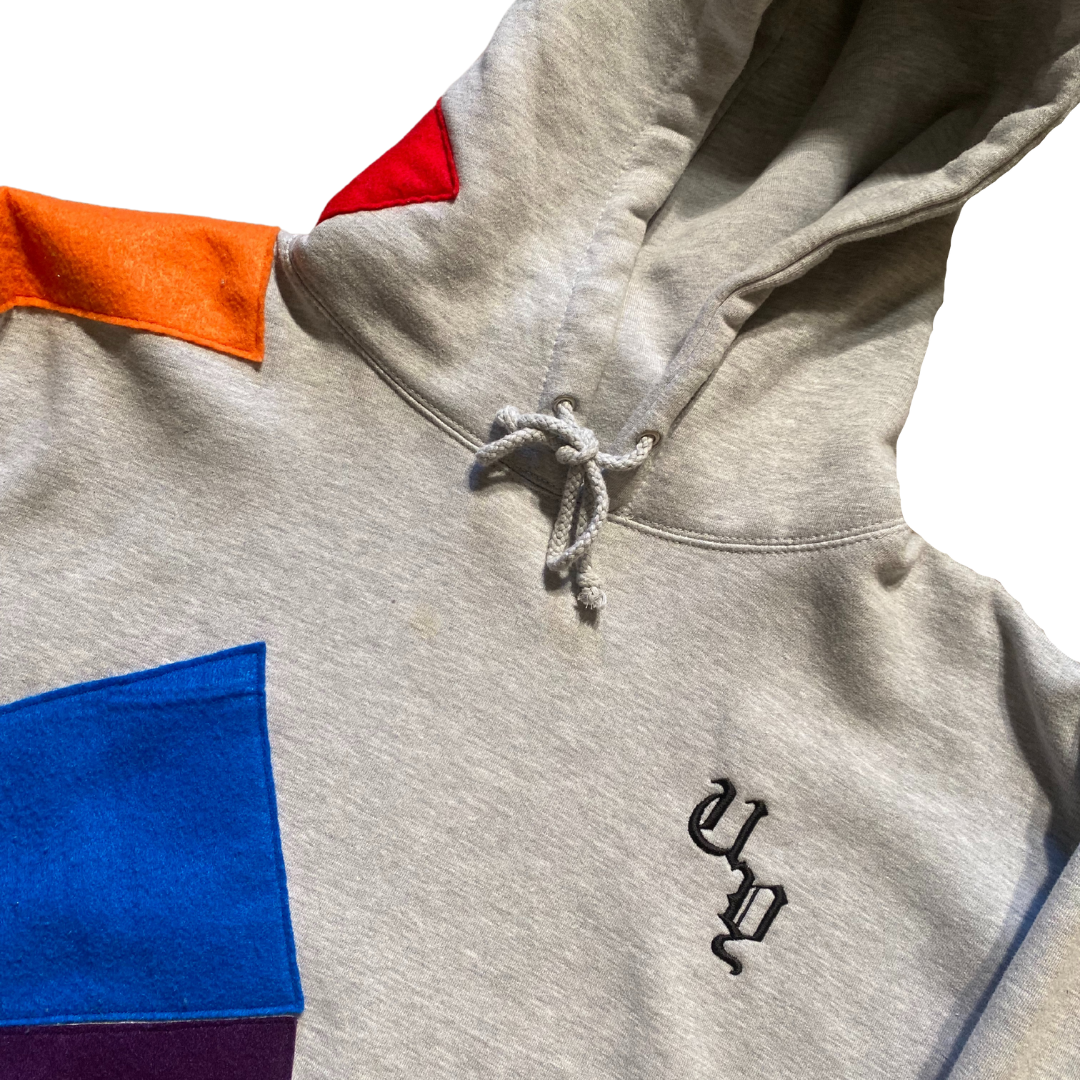 Unapologetic Youth Light Beams large hoodie with bold graphic design, soft fabric, and comfortable fit in black and white.