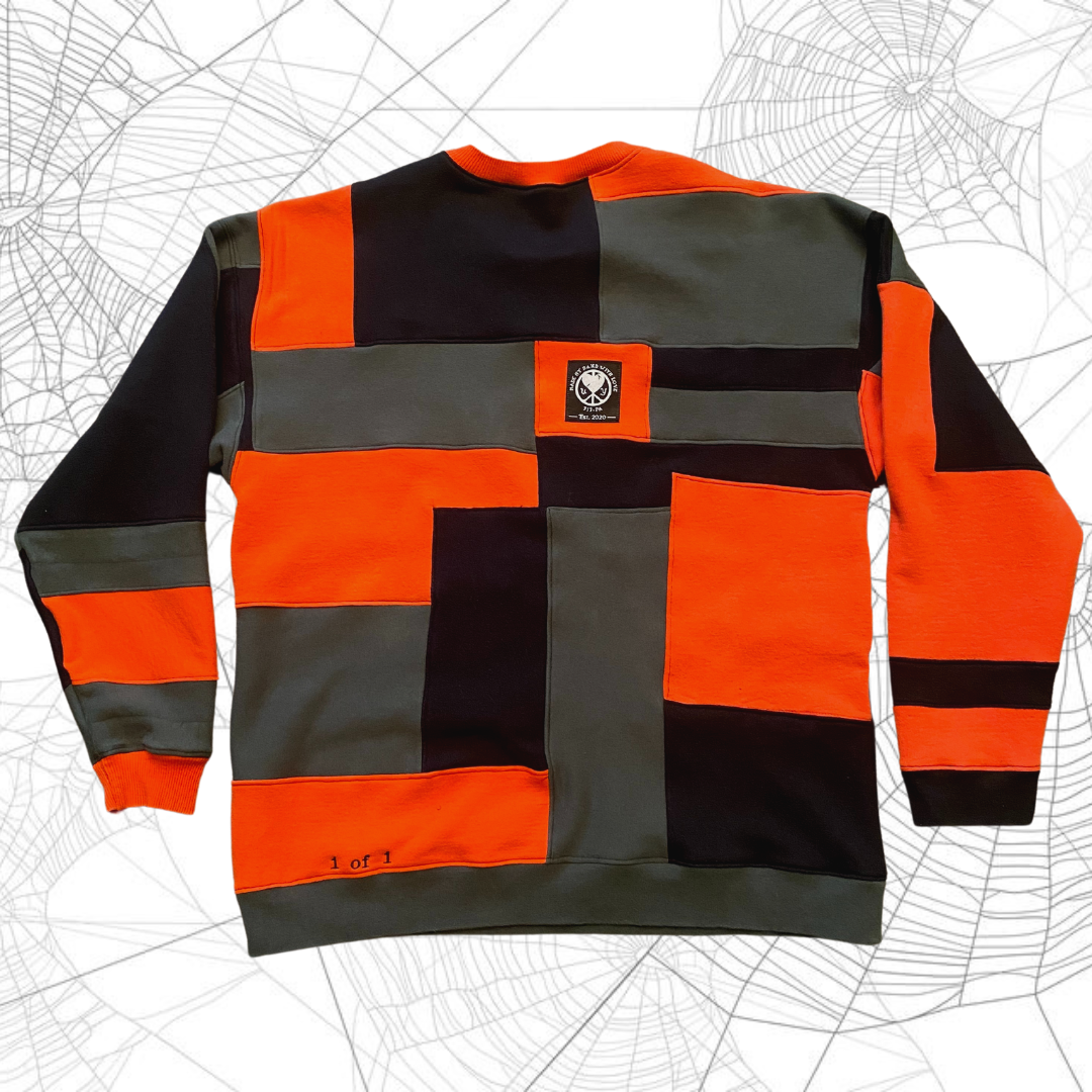 Unapologetic Youth Spooky V2 crewneck sweatshirt, featuring dark graphic design on black fabric, casual streetwear style.