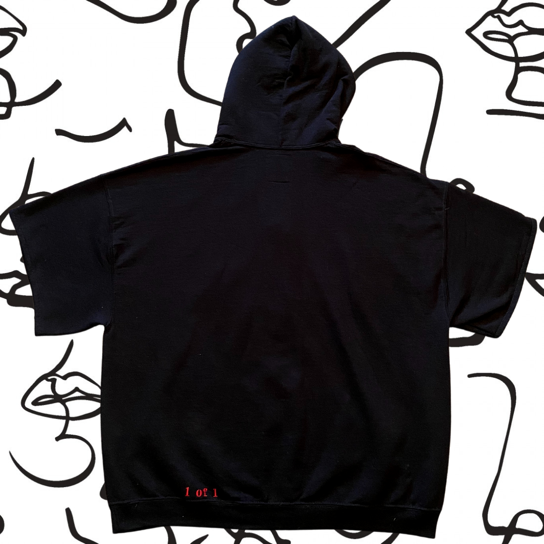 Unapologetic Youth Faces sweatshirt featuring a graphic print of two stylized faces on a casual sweatshirt.
