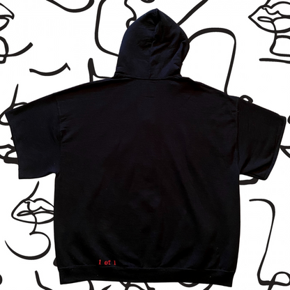 Unapologetic Youth Faces sweatshirt featuring a graphic print of two stylized faces on a casual sweatshirt.