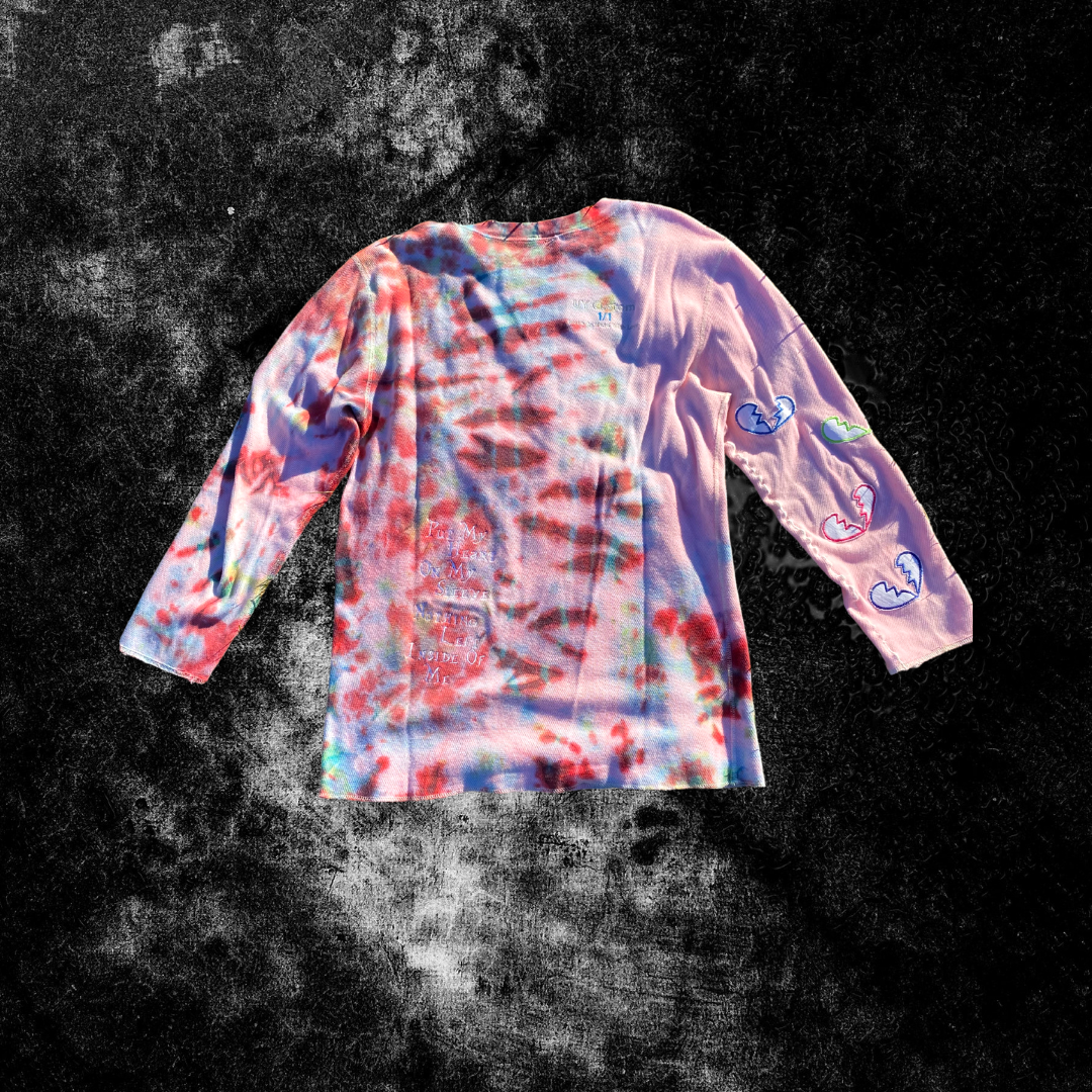Long sleeve shirt with numbness graphic from Unapologetic Youth x Carhartt, featuring bold design on soft fabric.