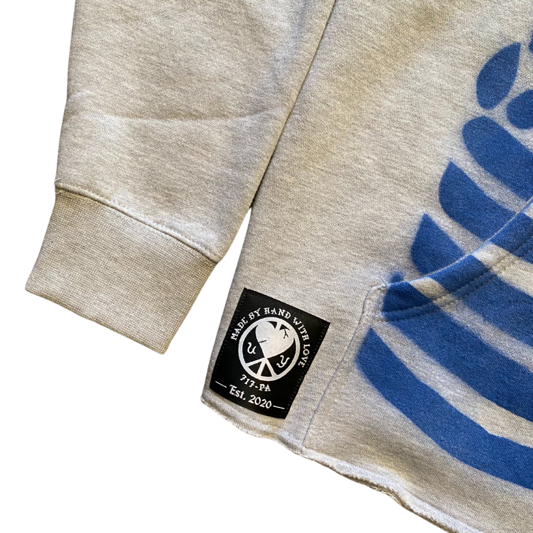 Unapologetic Youth To The Bone hoodie in medium, featuring a stylish black hoodie with graphic design and front pocket.