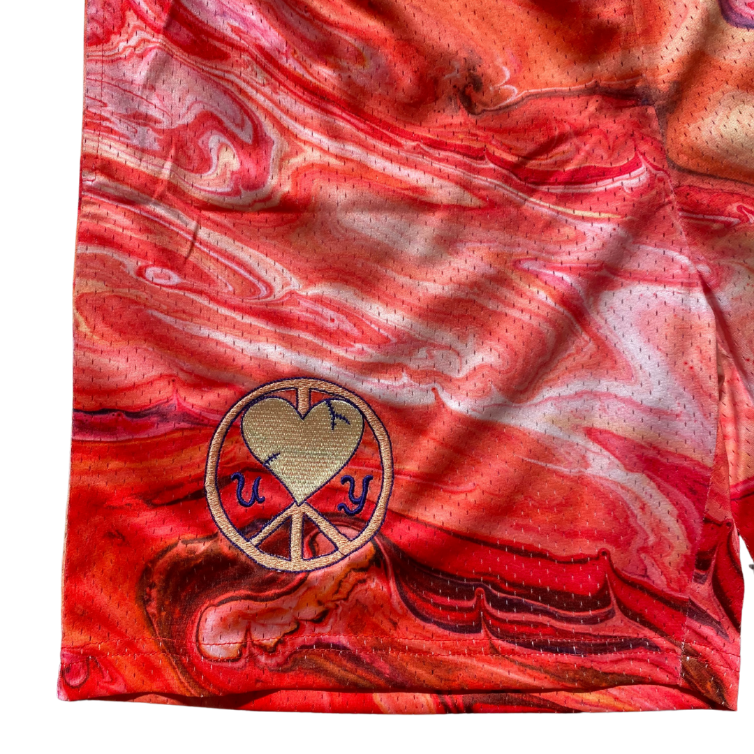 Unapologetic Youth Mars Landing shorts with bold space-themed design, featuring vibrant colors and cosmic patterns.