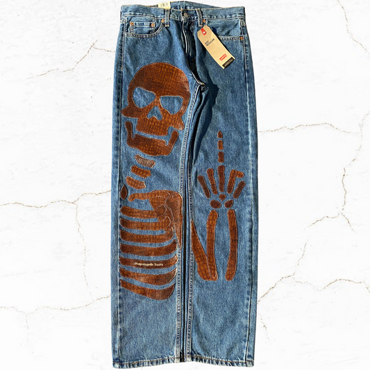 Unapologetic Youth "To The Bone" jeans in light wash denim with distressed details and classic five-pocket design.