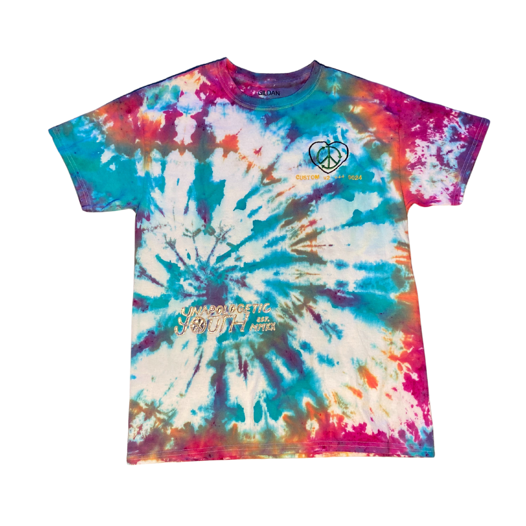 Black Unapologetic Youth T-Shirt with bold graphic print, casual fit, and short sleeves, displayed on a white background.
