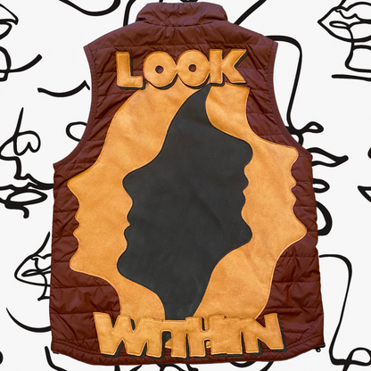 Unapologetic Youth Faces vest featuring colorful face illustrations, showcased on a mannequin against a neutral background.
