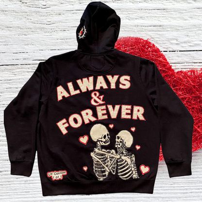 Unapologetic Youth Always & Forever large zip-up hoodie in black, featuring front pockets and a hood with drawstrings.