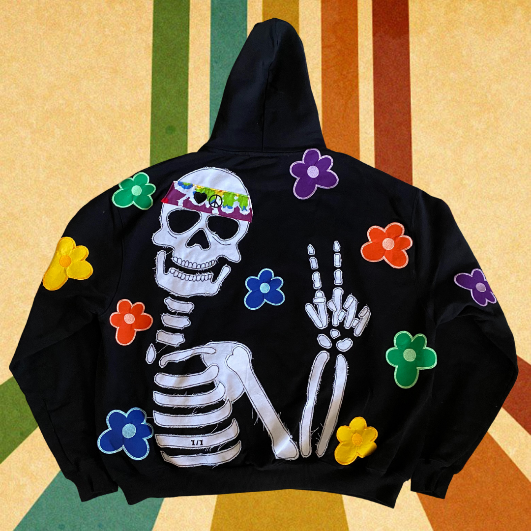 Unapologetic Youth Hippie Dreams hoodie featuring colorful, bohemian-inspired design with a relaxed fit and cozy fabric.