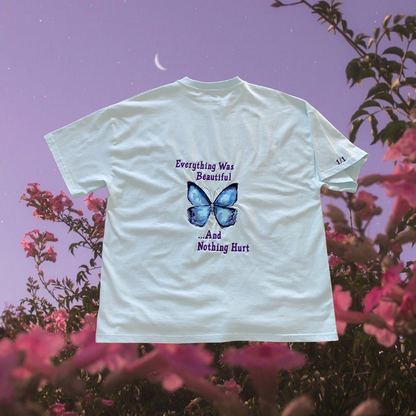 Unapologetic Youth T-shirt featuring a stylish wings graphic print on the front, casual and comfortable for everyday wear.