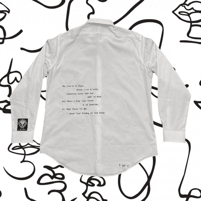 Unapologetic Youth button-down shirt featuring a bold face pattern, long sleeves, and classic collar for a stylish look.