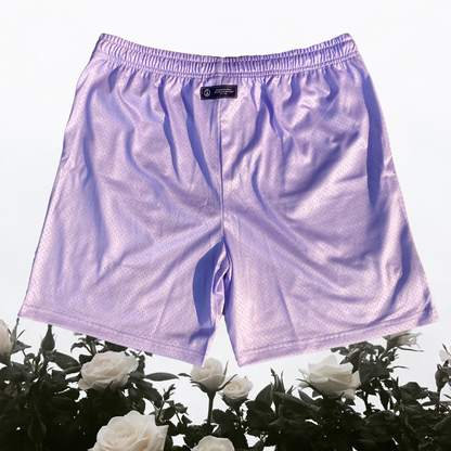 Unapologetic Youth Rose City shorts in vibrant pink with a relaxed fit, displayed on a neutral background.