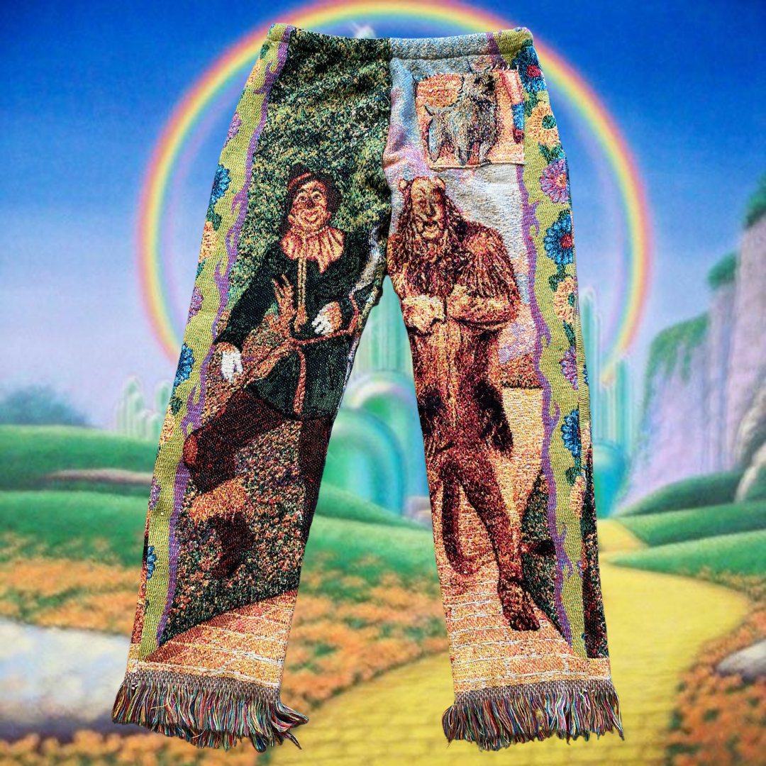 Pair of Unapologetic Youth Wonderful Wizard woven pants featuring colorful patterned fabric and relaxed fit.