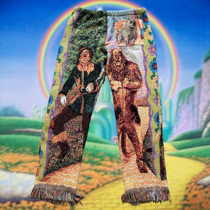 Pair of Unapologetic Youth Wonderful Wizard woven pants featuring colorful patterned fabric and relaxed fit.