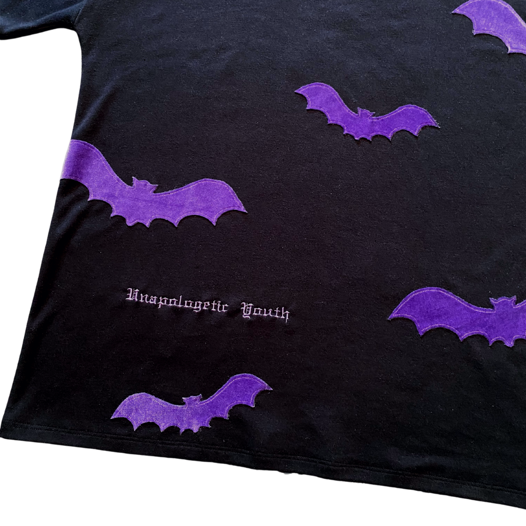 Unapologetic Youth Spooky v2 T-shirt featuring spooky graphic design on black fabric, casual and stylish apparel.