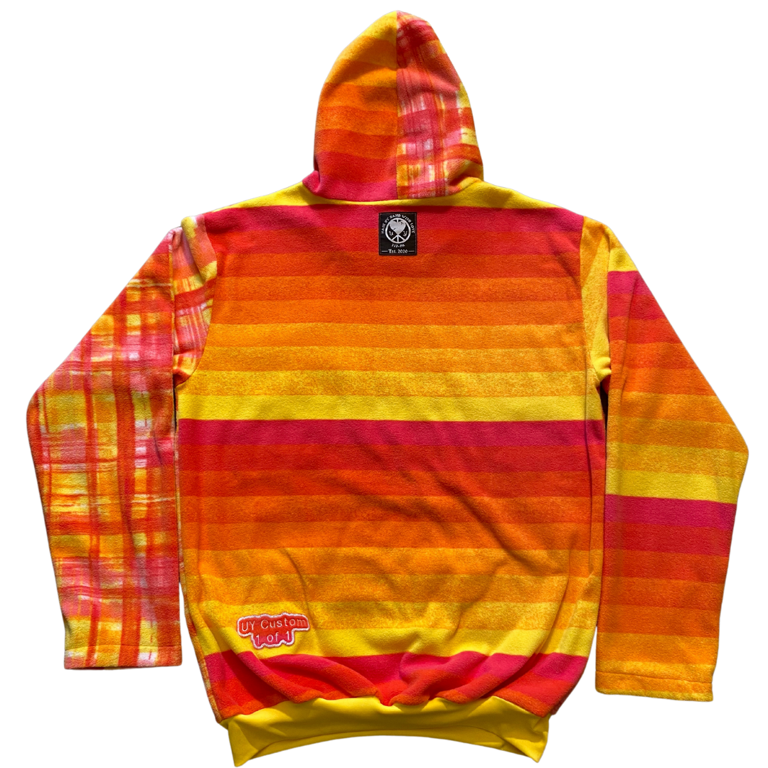 Medium Unapologetic Youth Starburst hoodie in black with colorful starburst design, casual fit, and drawstring hood.