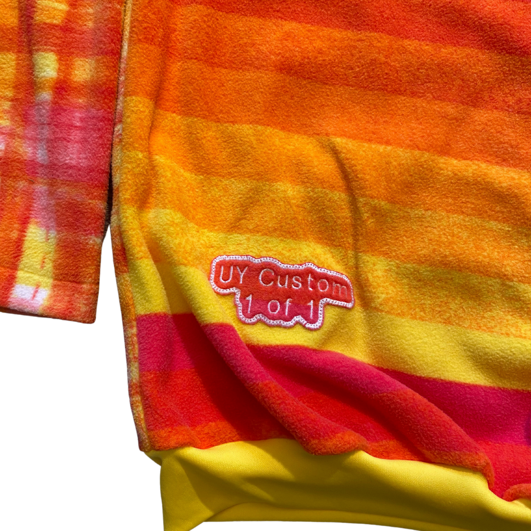 Medium Unapologetic Youth Starburst hoodie with colorful starburst design on the front, casual fit, soft fabric, and adjustable drawstrings.