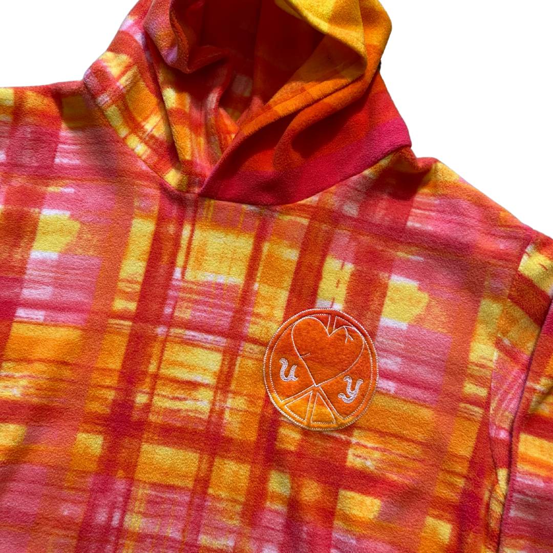 Unapologetic Youth Starburst medium hoodie featuring a colorful starburst graphic on soft fabric, casual streetwear style.