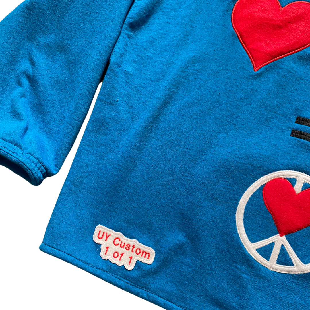 Unapologetic Youth Peace + Love 2XL hoodie featuring a colorful graphic design on the front.
