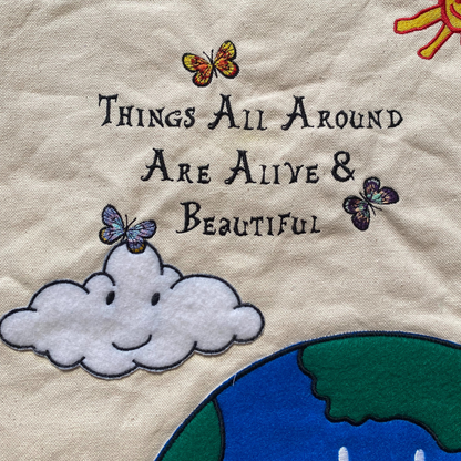 Unapologetic Youth Mother Nature tote bag with eco-friendly design and natural landscape illustration on durable fabric.