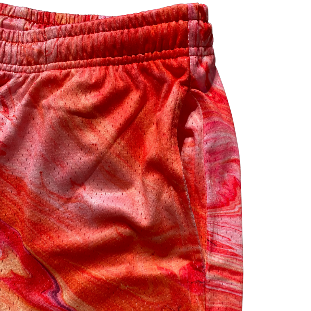 Unapologetic Youth Mars Landing shorts shown from a 3/4 angle with space-themed design and comfortable fit.