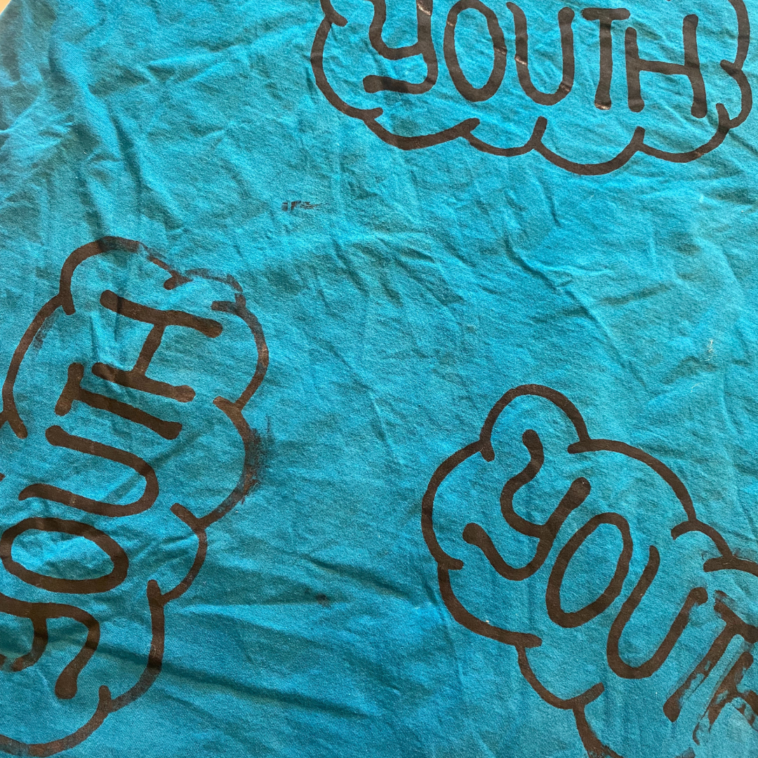 Unapologetic Youth Freedom T-Shirt in 3XL, featuring bold graphic design on soft fabric, casual streetwear style.