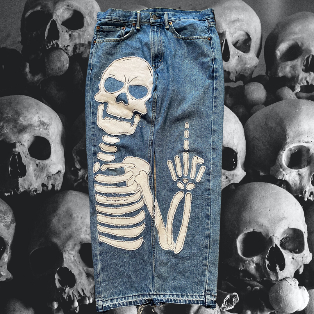 Blue denim jeans from Unapologetic Youth x Levi's "To The Bone" collection, featuring classic fit and detailed stitching.