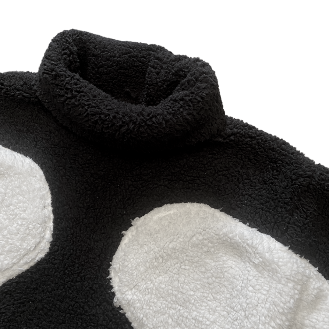 Unapologetic Youth Spooky v1 fleece hoodie with spooky design, soft fabric, and comfortable fit, shown in a close-up view.
