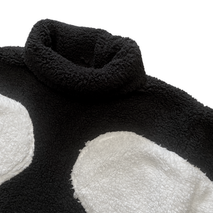 Unapologetic Youth Spooky v1 fleece hoodie with spooky design, soft fabric, and comfortable fit, shown in a close-up view.