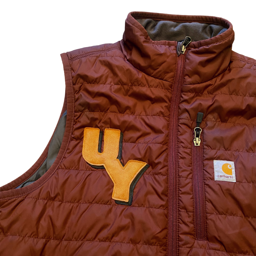 Unapologetic Youth vest featuring bold face graphic design, casual streetwear style, and comfortable fit.
