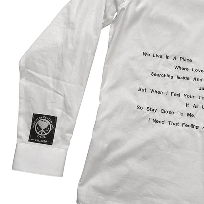 Three faces button-down shirt by Unapologetic Youth featuring a colorful face print on soft fabric.