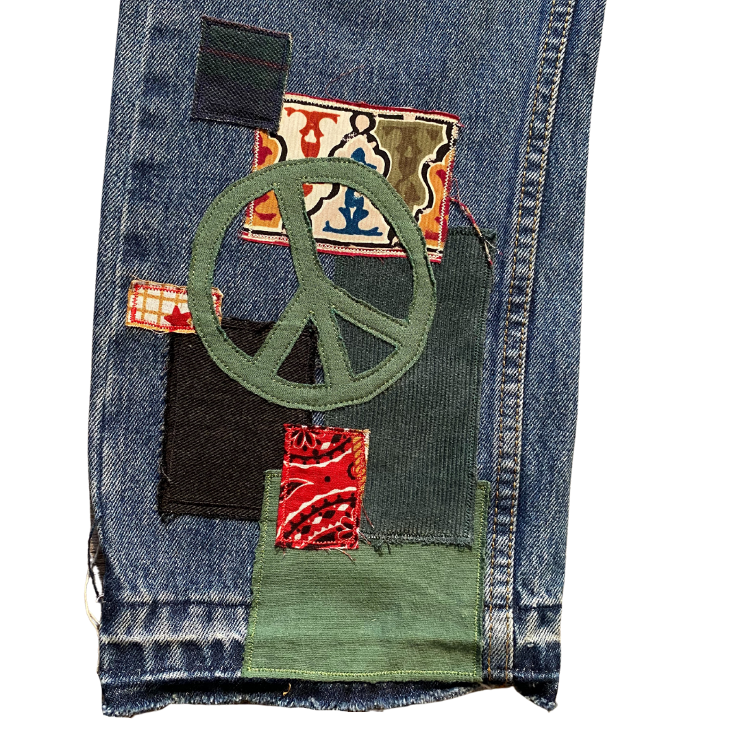 Unapologetic Youth Peaceful Cowboy jeans, 32x32, featuring classic denim with detailed stitching and a relaxed fit.