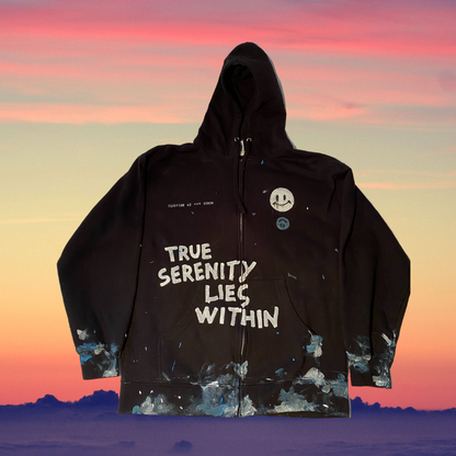 Unapologetic Youth hoodie in black with front pocket and drawstring hood, casual streetwear style.