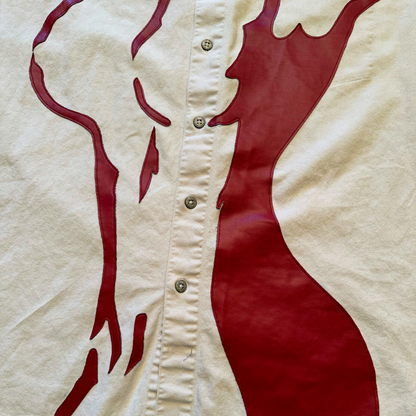 Unapologetic Youth button-down shirt featuring a neutral nude tone, casual fit, and classic collar, displayed on a hanger.