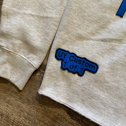 Unapologetic Youth To The Bone hoodie in medium, featuring a black hoodie with bold white graphic text and a front pocket.