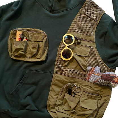 Unapologetic Youth large tactical hoodie featuring a rugged design with multiple pockets and military-inspired details.