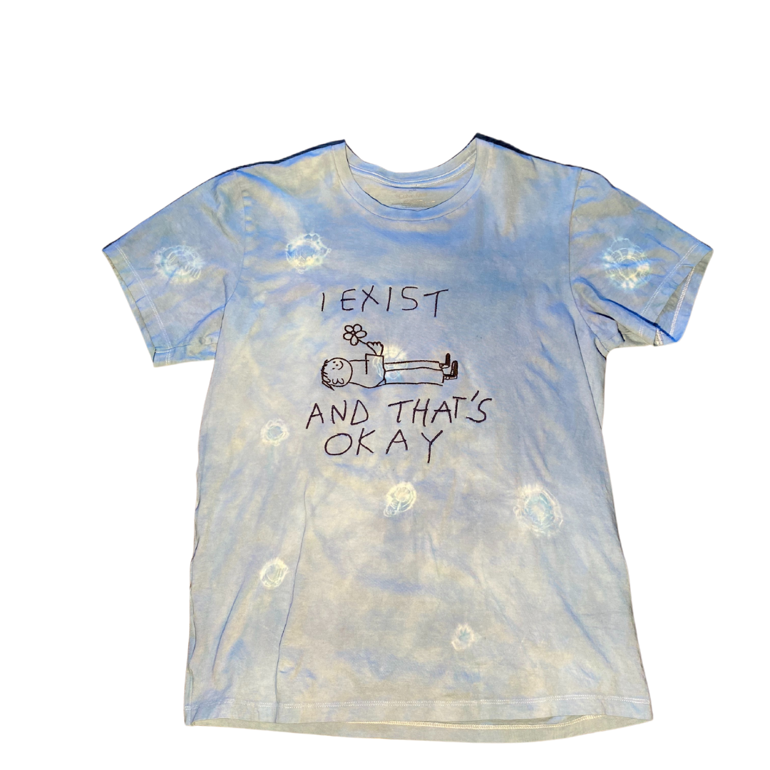 Unapologetic Youth T-Shirt featuring bold graphic design, soft cotton fabric, and a relaxed fit for casual wear.