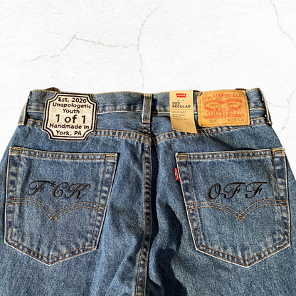Unapologetic Youth "To The Bone" 1/1 jeans, showcasing distressed denim with a slim fit and stylish design.