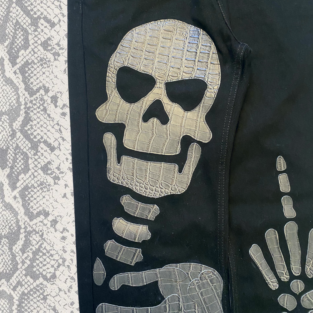 Unapologetic Youth "To The Bone" jeans, 1/1 fit, showcasing distressed denim with stylish rips and classic blue wash.
