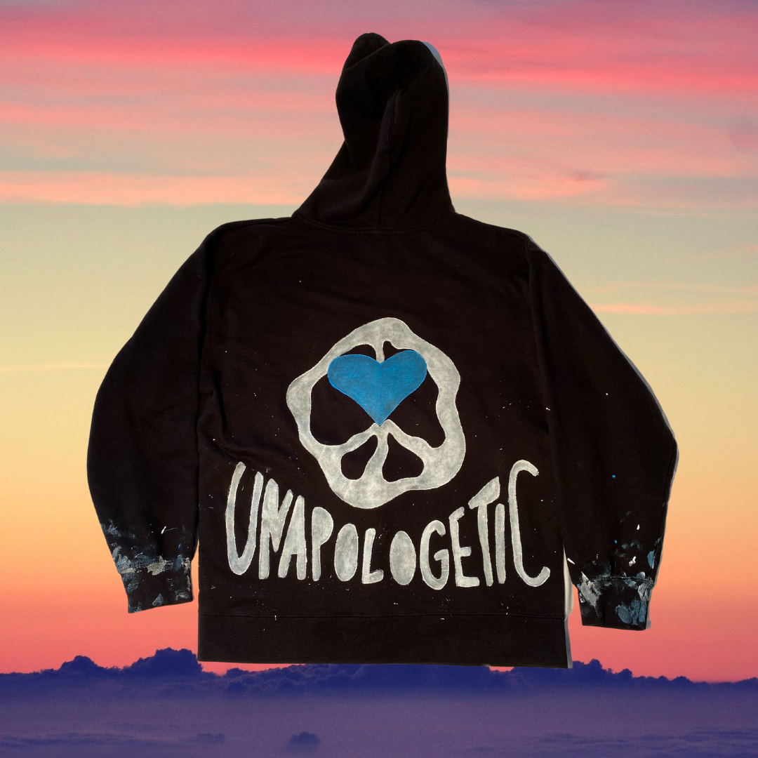 Unapologetic Youth hoodie showing a front view with a relaxed fit, soft fabric, and casual style in a neutral color.