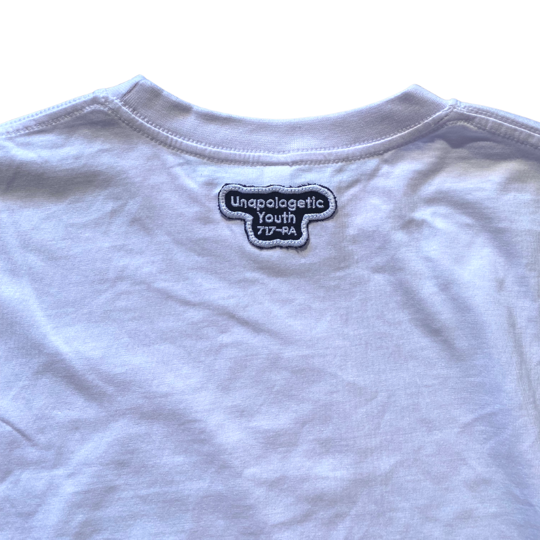 White Essential Skelly T-Shirt by Unapologetic Youth featuring a skeleton graphic on the front.
