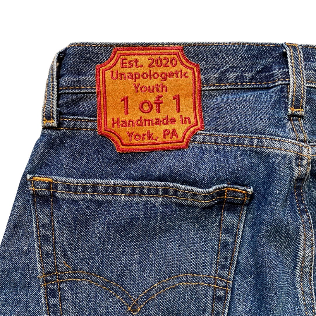 Unapologetic Youth Groovy 30x30 jeans in classic denim with a relaxed fit and detailed stitching.