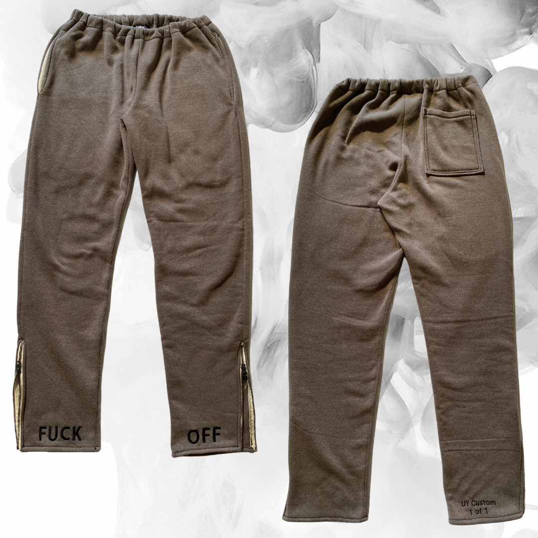 Unapologetic Youth F*cked medium sweatpants with bold text design, soft fabric, and relaxed fit suitable for comfortable casual wear.