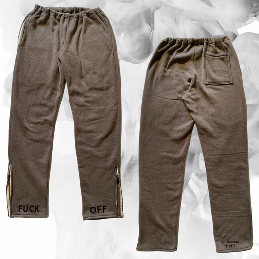 Unapologetic Youth F*cked medium sweatpants with bold text design, soft fabric, and relaxed fit suitable for comfortable casual wear.