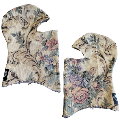 Black Unapologetic Youth balaclava covering the head and face, made of stretchy fabric for warmth and full facial coverage.