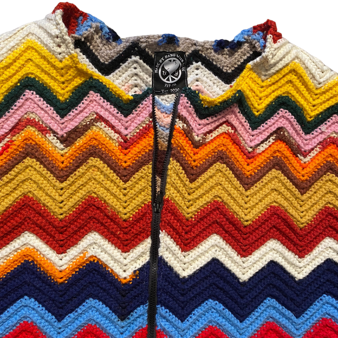 Unapologetic Youth Grandma's Crochet 4/4 T-shirt featuring a colorful crochet design on soft fabric.