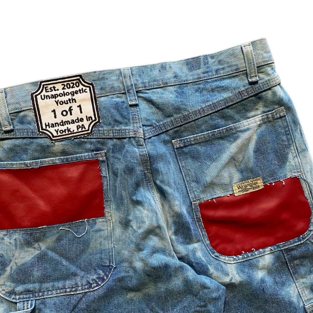 Unapologetic Youth To The Bone 32x32 jeans with classic denim wash and five-pocket design on a plain background.