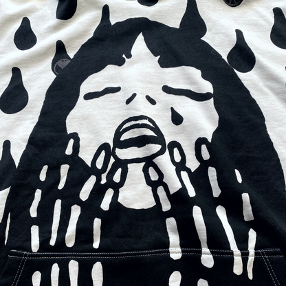 Unapologetic Youth Rain On My Skin hoodie featuring a rain-themed graphic design on soft black fabric.