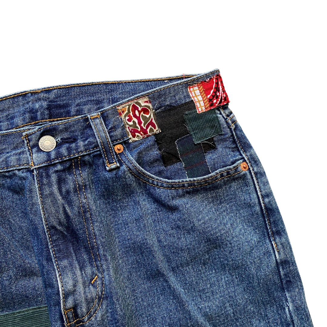 Unapologetic Youth Peaceful Cowboy 32x32 jeans with classic denim wash and detailed stitching on a white background.