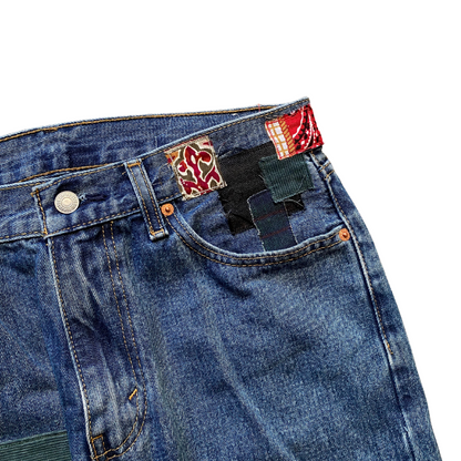 Unapologetic Youth Peaceful Cowboy 32x32 jeans with classic denim wash and detailed stitching on a white background.