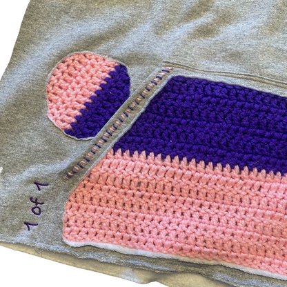 Unapologetic Youth Grandma's Crochet hoodie in gray with front pocket and hood, casual streetwear style.